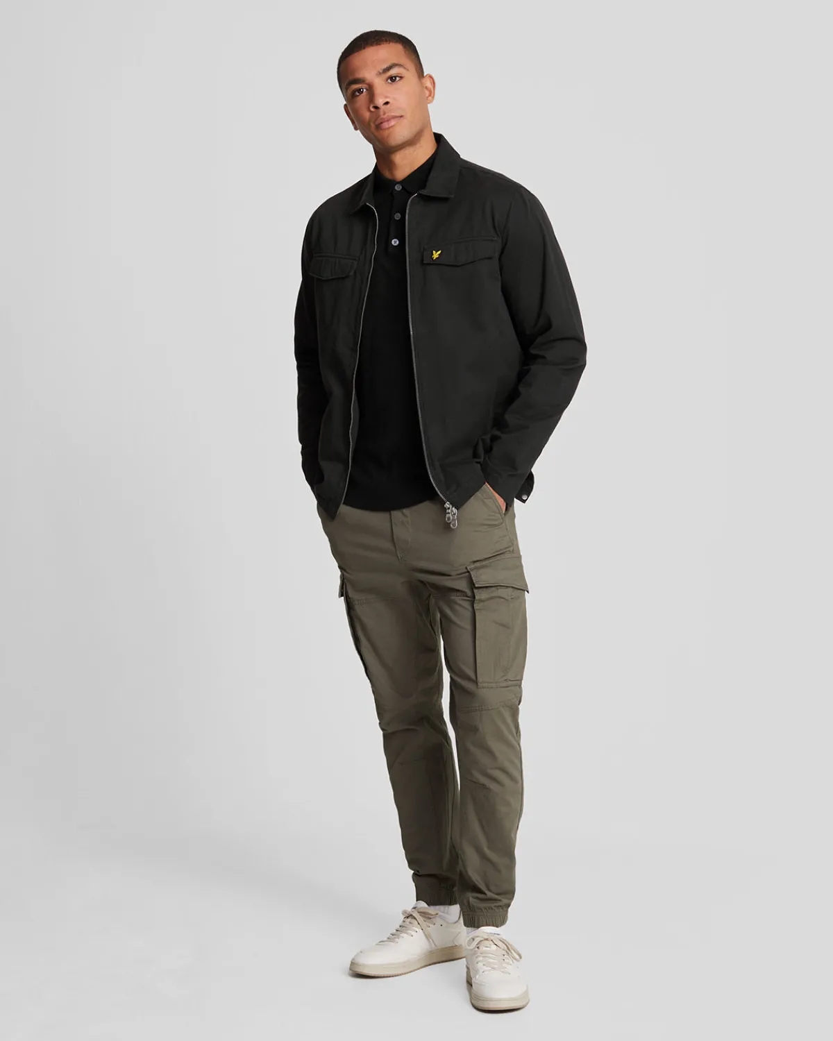 langrmeliges_gestricktes_poloshirt_aus_baumwolle_und_merino_1.webp Lyle & Scott Polohemden<Langärmeliges gestricktes Poloshirt aus Baumwolle und Merino JetBlack