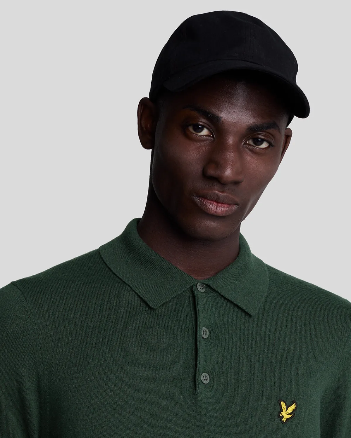 langrmeliges_gestricktes_poloshirt_aus_baumwolle_und_merino_3-2.webp Lyle & Scott Polohemden<Langärmeliges gestricktes Poloshirt aus Baumwolle und Merino ArgyleTeal