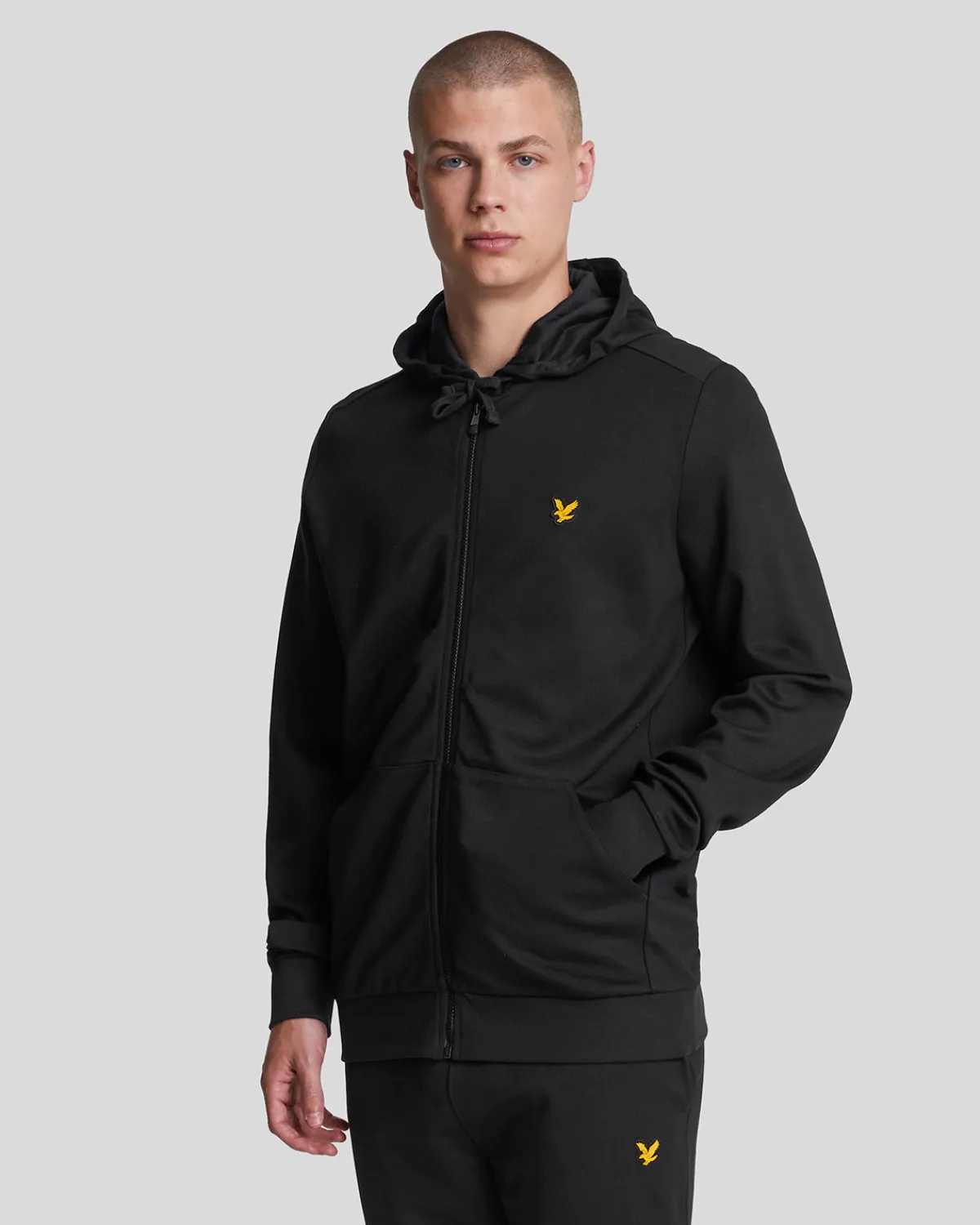 sportkapuzenpulli_mit_reiverschluss_0-1.webp Lyle & Scott Sportbekleidung | Kapuzenpullover<Sport-Kapuzenpulli mit Reißverschluss Pechschwarz