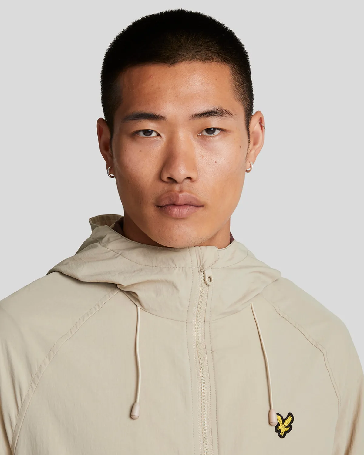 windbreaker_jacke_mit_kapuze_3.webp Lyle & Scott Vermächtnis<Windbreaker Jacke mit Kapuze Stone
